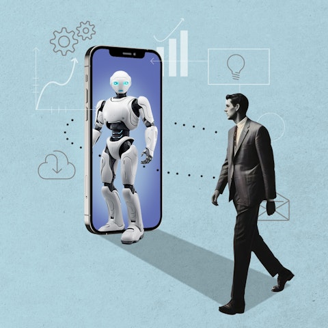 man in suit walking by human size phone with a robot stepping out of it