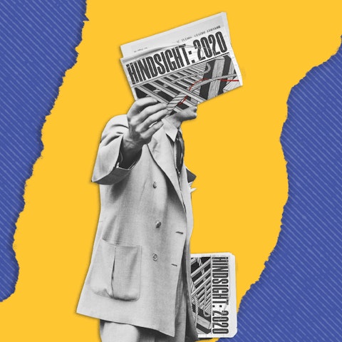person holding news papers in both hands with the caption hindsight 2020