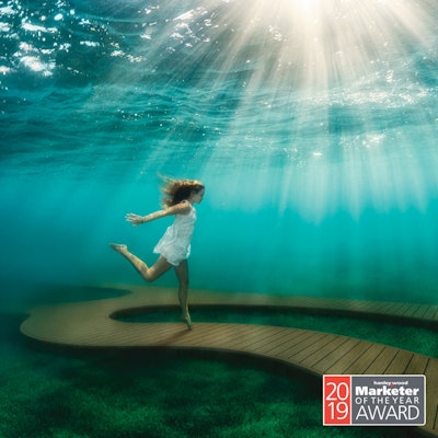 women dancing on MoistureShield deck under water