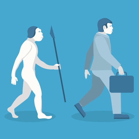 cartoon of the change from caveman carrying a spear to business man carrying a briefcase