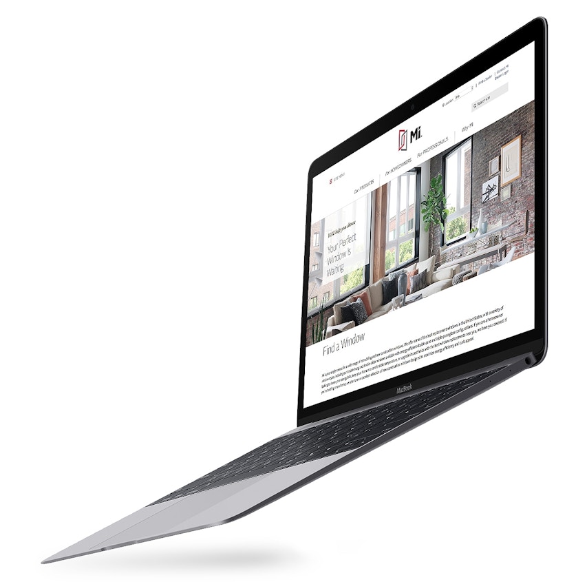 laptop with MI windows website on it