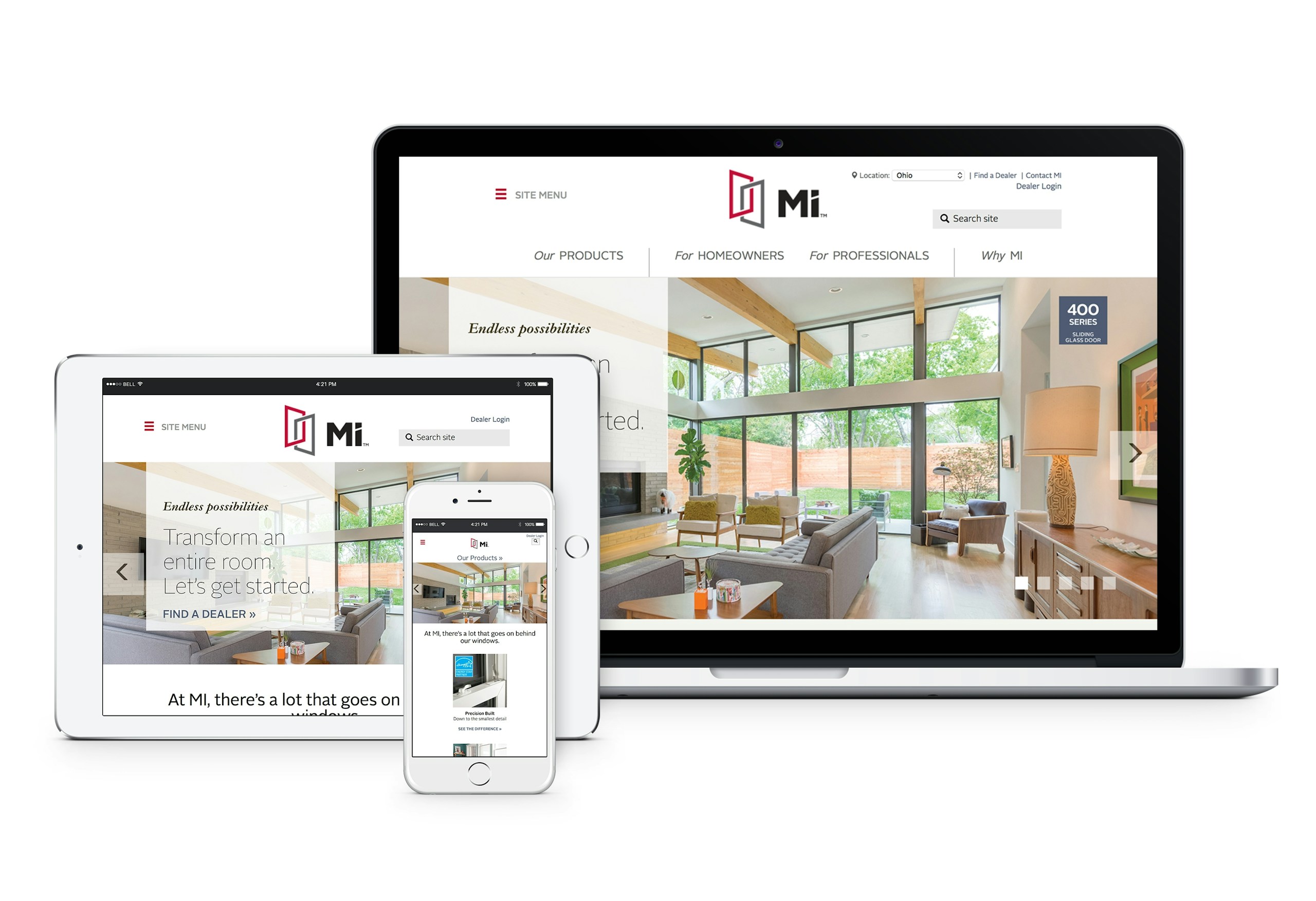 laptop tablet and phone with the MI windows website displayed