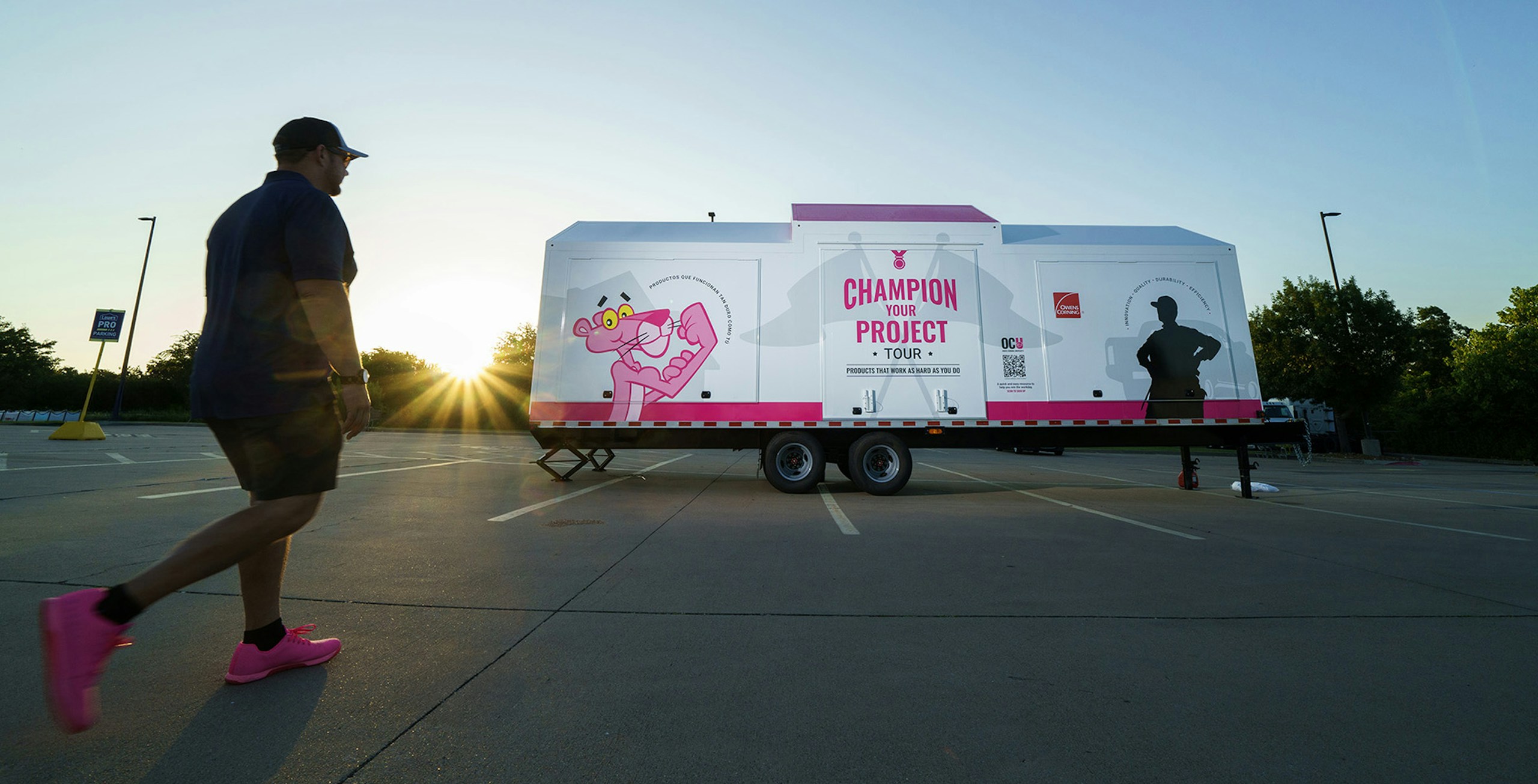 Owens Corning Insulation road show trailer sitting in a parking lot