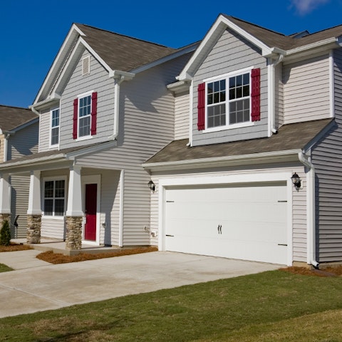 exterior view of two story two car garage home